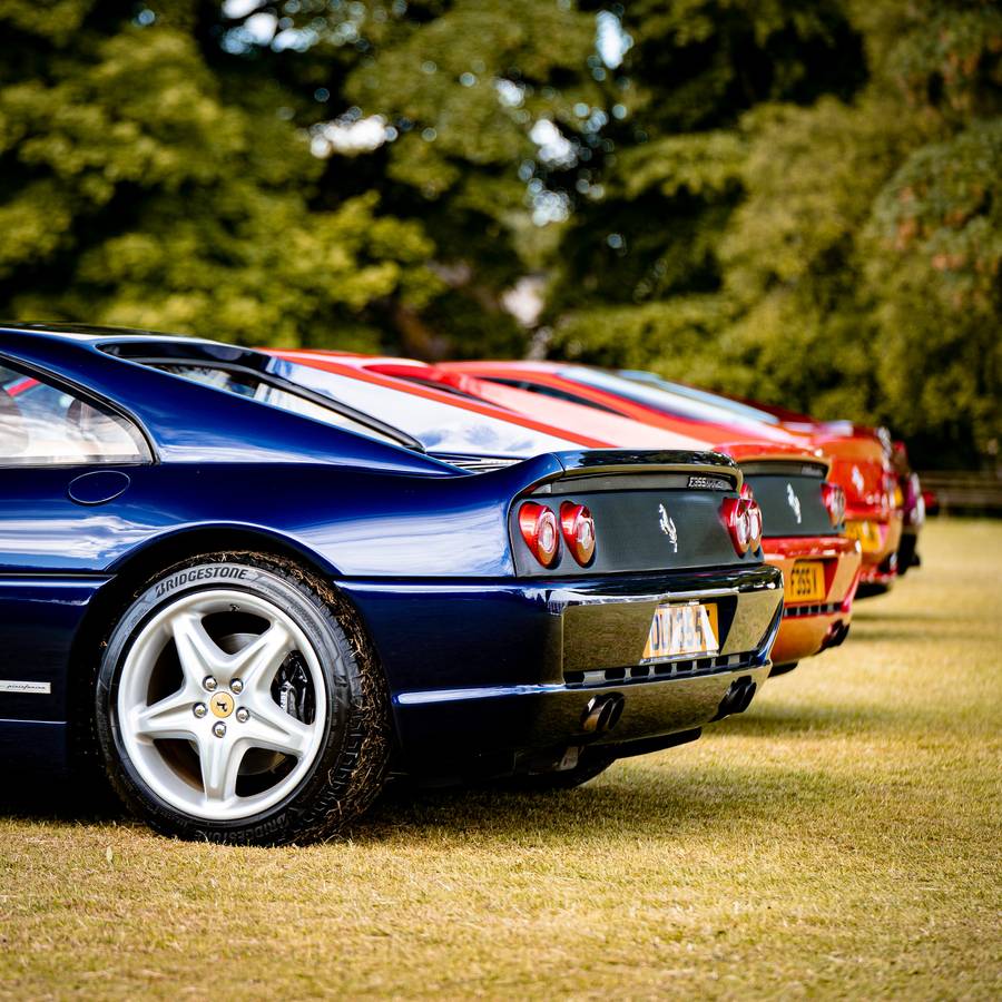Row of classic Ferraris on the lawn at the Churchill Car Show
